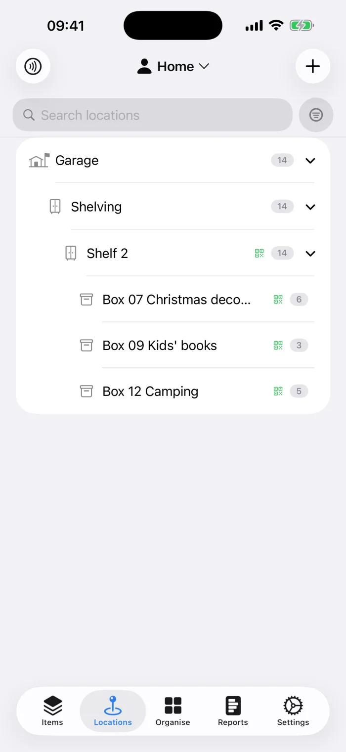 The Locations tab in additem.to showing Garage, then Shelving, then Shelf 2, with three boxes on the shelf. Box 07 Christmas decorations holds 6 items, Box 09 Kids' books holds 3 and Box 12 Camping holds 5, and each box has a QR code